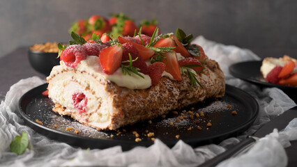 Sweet Berry Meringue Roulade with Cream and Fresh Strawberries