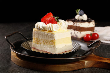 Delicious Handmade Velvet Cake Slice with Fresh Strawberries and Cream