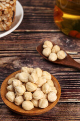 Roasted Hazelnut Kernels Snack on Rustic Wood Table