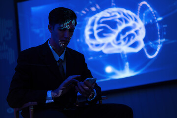 Business professional engaged with smartphone while analyzing digital brain concept in modern office setting
