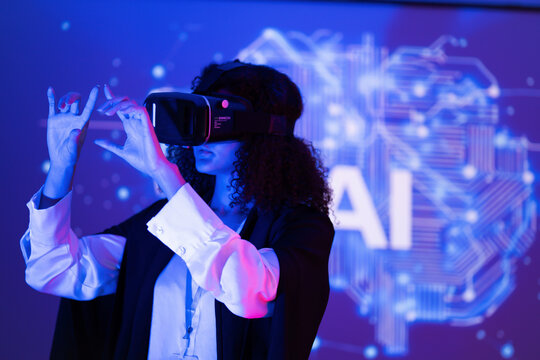 Engaging with virtual reality in a tech space showcasing artificial intelligence concepts - Powered by Adobe