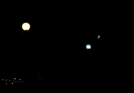 Two lights and the moon