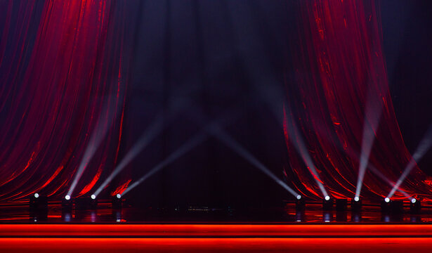 red curtains with a stage and spotlights for the background - Powered by Adobe