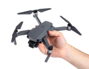 A close-up shows a grey unmanned aerial vehicle held in a human hand against a transparent backdrop