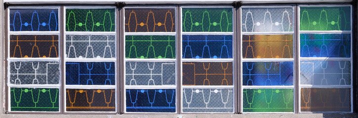 Antique Decorative glass window, featuring colored textured panels with geometric or repetitive patterns