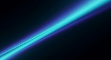 Fototapeta premium Abstract diagonal bright blue and cyan light streak on dark background