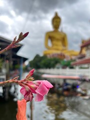 The giant seated buddha statue at the Wat Paknam Phasi Charoen temple, Famous place in Bangkok.
