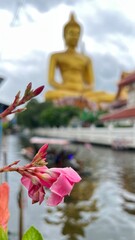 The giant seated buddha statue at the Wat Paknam Phasi Charoen temple, Famous place in Bangkok.
