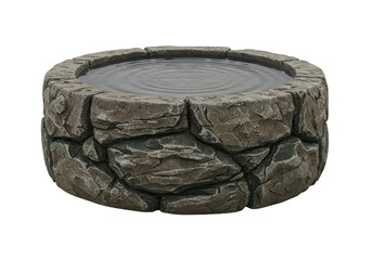 Stone fountain with water ripples on black background