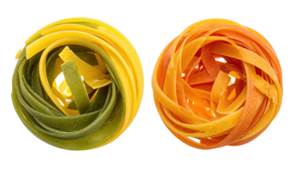 Two pasta nests, one green & yellow, the other orange & yellow, on black