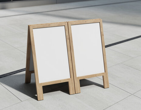 A wooden double-sided signboard stands on a tiled floor, awaiting advertisement or information display