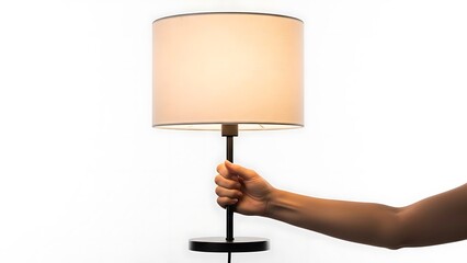 hand holding a table lamp