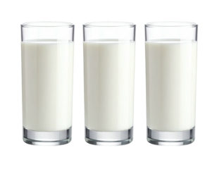 Three tall glasses filled with a white, opaque liquid