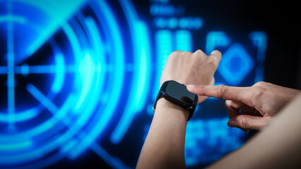 Closeup of modern smartwatch worn on human wrist against futuristic blue motion lights, wearable technology, innovation, connectivity, digital lifestyle, smart health monitoring, interface, future.