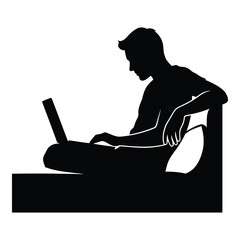 Man sitting comfortably working on laptop in modern workspace