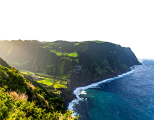 A coastal landscape featuring dramatic cliffs meeting the ocean. Sunlit valleys nestle along the shoreline with lush greenery