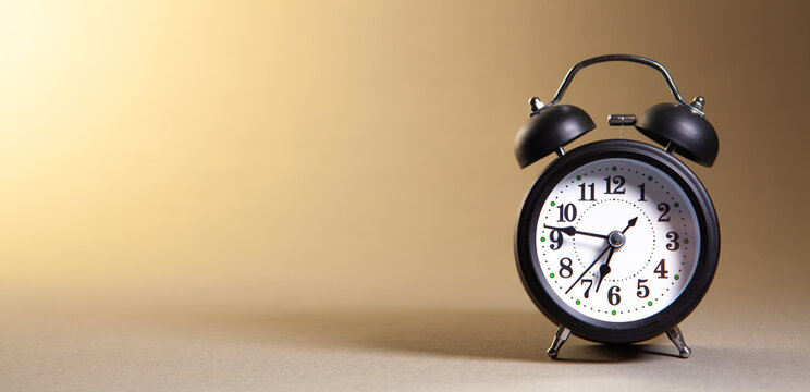 alarm clock on the white background with copy space