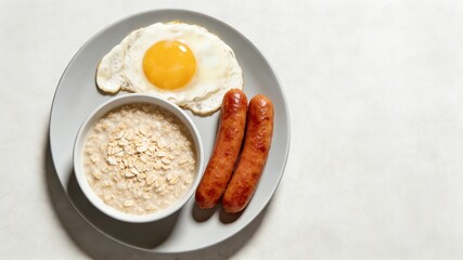 Savory Breakfast Platter with Fried Egg, Sausages and Oatmeal (Balanced Morning Meal)