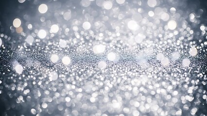 Festive red ornaments hanging from snowy evergreen branches with sparkling golden holiday lights creating a warm winter atmosphere