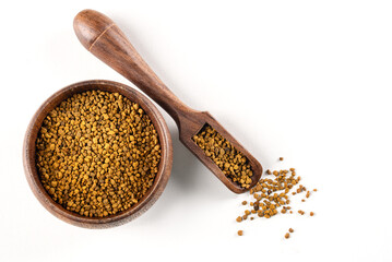 Honey bee pollen in wooden bowl