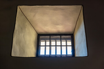 Interior View of Window with Vertical Grille in Spanish Mission Architecture