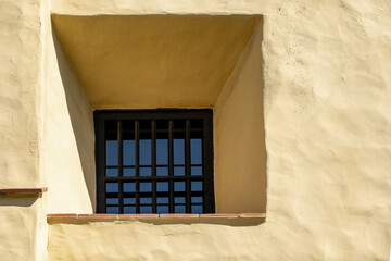 Window with Vertical Grille on Spanish Mission Architecture