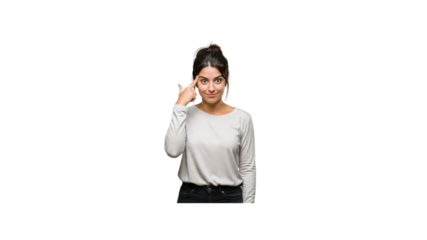 Woman gesturing with finger to temple