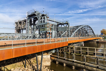 Close-up view of the steel structure and lift mechanism of the Oude IJsselbrug bridge in Zutphen, Netherlands, crossing the river IJssel.
