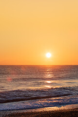 Golden Sunrise Over the Ocean Horizon