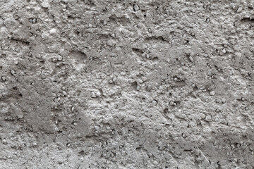 Grey wall with a rough texture