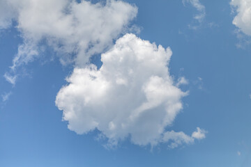 Large cloud in the sky with a blue sky background