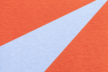 Abstract geometric orange paper background with pastel blue ray, macro texture for banner, template, presentation