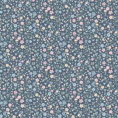 Cute Floral pattern in the small flower. 
Ditsy print. Gentle flower seamless pattern. Pretty mini plants on blue field. Botanical design textile texture. Tiny colorful flowers on blue background