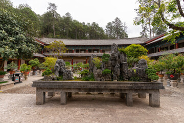Fototapeta premium Beautiful architecture of Dongba Culture Research Institute at Black Dragon Pool Park in Lijiang Old Town, China
