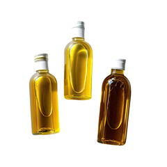 Three glass bottles holding golden liquids on black