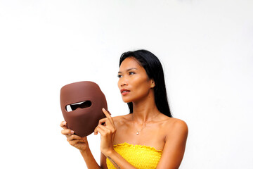 Portrait series of woman interacting with LED facial mask for skincare, beauty tech, and light therapy. Concept of modern wellness and self-care innovation.