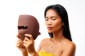 Portrait series of woman interacting with LED facial mask for skincare, beauty tech, and light therapy. Concept of modern wellness and self-care innovation.