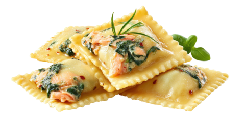 Close-up of four stuffed pasta squares, filled with salmon and spinach, garnished with herbs