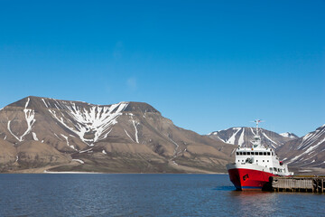 Icebreaker ship docked at harbor in Longyearbyen Svalbard Norway landscape
