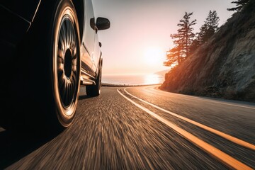 Sleek Electric Vehicle Car Cruising Along Scenic Coastal Highway at Sunset