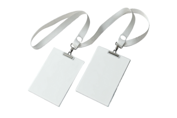 Two blank, rectangular white name badge holders hanging on white lanyards