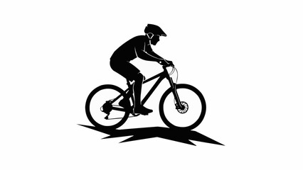 Silhouette of a mountain biker riding a bicycle.