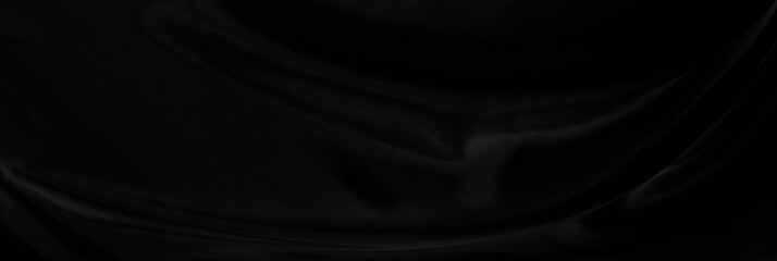Black gray satin dark fabric texture luxurious shiny that is abstract silk cloth panorama...