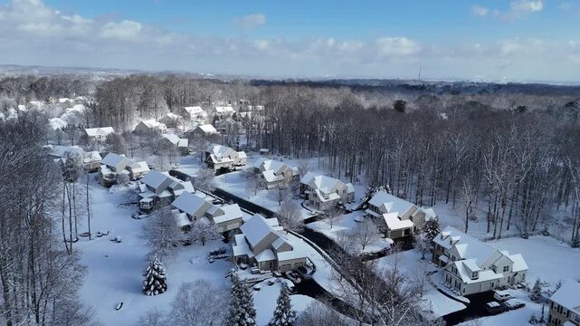 Arial view of a single-family house residential community after snow in Garnet Valley, suburb of Philadelphia