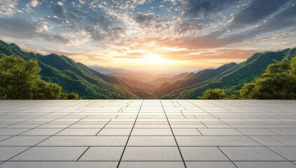 Panoramic view of verdant mountains under a golden sunrise sky with clouds