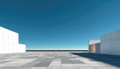 Modern, minimalist architecture with geometric concrete structures under a clear sky