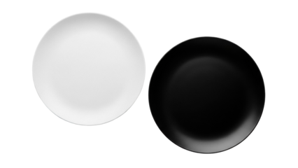 Black and white plates PNG isolated on transparent background, contrasting dishware for dining and kitchen design