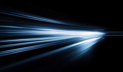 Streaks of bright light zoom across a dark background, evoking speed and motion