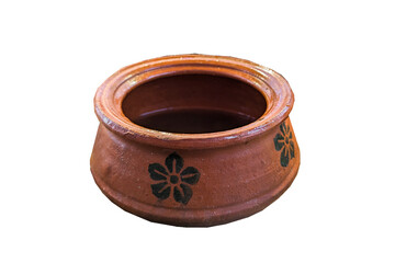 A rustic, round terracotta pot, brown earthenware, shows horizontal lines from its creation. Its a simple, traditional cooking or storage vessel.