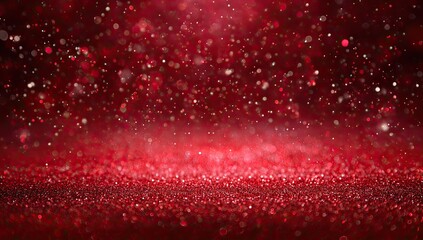 Red glitter sparkles cascade and shimmer across a glowing textured surface